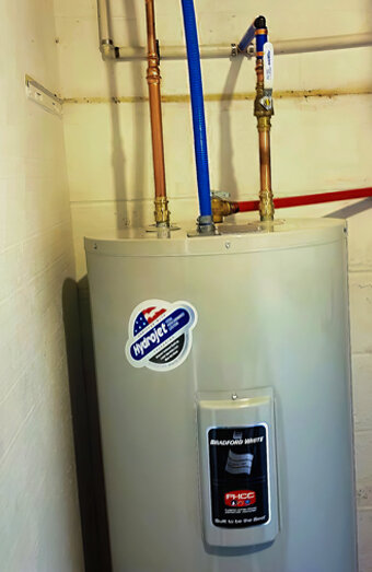 https://warwickhotwater.com.au/uploads/2025/06/electric-hot-water-system-32554.jpg